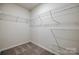 Walk-in closet with wire shelving and carpeted floors at 5014 Fandango Rd, York, SC 29745