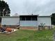 Showing home exterior, yard equipment and systems for a single-story home at 51 Kings Dr, Taylorsville, NC 28681