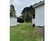 Backyard featuring a shed and a portion of a home at 51 Kings Dr, Taylorsville, NC 28681
