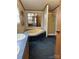 Bathroom showcasing a shower, bathtub, vanity, and a large mirror at 51 Kings Dr, Taylorsville, NC 28681