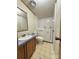 Bathroom featuring a walk-in tub, toilet, and vanity with sink at 51 Kings Dr, Taylorsville, NC 28681