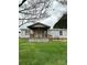 Inviting single-level home boasting a cozy covered porch and landscaped front yard at 51 Kings Dr, Taylorsville, NC 28681