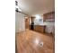 Functional kitchen features wood cabinets, laminate floors, and essential appliances at 51 Kings Dr, Taylorsville, NC 28681