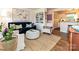 Bright and airy living room features a modern sofa, unique art, and stylish decor at 557 Wakefield Dr # A, Charlotte, NC 28209
