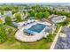 Aerial view of community pool area with shade structures, pool, and landscaping at 5716 Langwell Ln, Charlotte, NC 28278