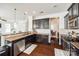Modern kitchen features granite countertops and stainless steel appliances at 5716 Langwell Ln, Charlotte, NC 28278