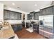 Modern kitchen features stainless steel appliances and ample storage space at 5716 Langwell Ln, Charlotte, NC 28278