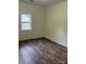 Bedroom featuring natural light and hardwood floors at 59 Pine St, Great Falls, SC 29055