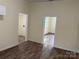 A spacious living room showcasing an open floor plan and natural light at 59 Pine St, Great Falls, SC 29055