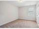 Comfortable bedroom with plush carpeting, natural light, and closet space at 620 Millstream Dr, Rock Hill, SC 29732