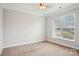 Cozy bedroom with plush carpet flooring, a window with blinds and neutral paint at 620 Millstream Dr, Rock Hill, SC 29732