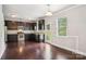Kitchen featuring wood floors, granite countertops, and stainless appliances at 620 Millstream Dr, Rock Hill, SC 29732