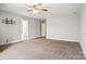 Spacious main bedroom with neutral walls, ceiling fan, and open doorways providing seamless flow at 620 Millstream Dr, Rock Hill, SC 29732