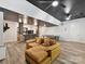 Finished basement with wet bar, lounge area with TV, ping pong table and space for entertaining at 633 Elmhurst Dr, Fort Mill, SC 29715