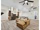 Finished basement with a bar, ping pong table, and comfortable seating area for entertaining at 633 Elmhurst Dr, Fort Mill, SC 29715