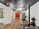 Finished basement with an exercise room featuring workout equipment and a sauna at 633 Elmhurst Dr, Fort Mill, SC 29715