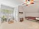 Attic bedroom with sloped ceilings, ceiling fan, plantation shutters, and lots of natural light at 633 Elmhurst Dr, Fort Mill, SC 29715