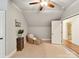 A bedroom shows a chair and closet, offering ample storage and a comfortable seating area at 633 Elmhurst Dr, Fort Mill, SC 29715