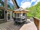 Spacious outdoor deck with seating area and large umbrella at 633 Elmhurst Dr, Fort Mill, SC 29715