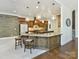 Gourmet kitchen with granite countertops, custom cabinetry, and stainless steel appliances at 633 Elmhurst Dr, Fort Mill, SC 29715