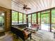 Covered porch featuring a hot tub and comfortable seating area at 633 Elmhurst Dr, Fort Mill, SC 29715