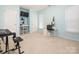 This light-filled bedroom offers lots of open space, perfect for a home office or music area at 653 Gable Oaks Nw Ln, Concord, NC 28027