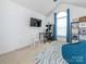 Bright bedroom with vaulted ceiling, desk, and large window with lots of natural light at 653 Gable Oaks Nw Ln, Concord, NC 28027