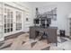 Well-lit home office with custom built-ins, a modern desk setup, and sophisticated decor for an inspiring workspace at 653 Gable Oaks Nw Ln, Concord, NC 28027