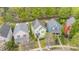 Aerial view of neighborhood homes with mature trees at 6707 Dunton St, Huntersville, NC 28078