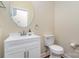 Powder room features a modern vanity and stylish round mirror at 6707 Dunton St, Huntersville, NC 28078
