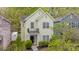 Inviting two-story home with a quaint balcony and manicured front yard landscaping at 6707 Dunton St, Huntersville, NC 28078