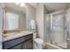 Clean bathroom features a granite countertop and shower with glass door at 826 Coralbell Way, Fort Mill, SC 29708