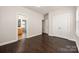 Spacious bedroom features hardwood floors, a large closet, and en suite bathroom at 10102 Tolleson Ave, Charlotte, NC 28277