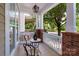 Cozy front porch with charming table and chairs, perfect for relaxing outdoors at 10102 Tolleson Ave, Charlotte, NC 28277