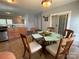 Eat-in kitchen with granite countertops, tile floors, and a sliding glass door at 1110 Valley St, Statesville, NC 28677