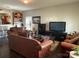 Spacious living room with hardwood floors, neutral paint, and comfortable seating arrangements at 1110 Valley St, Statesville, NC 28677