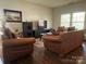 Inviting living room with hardwood floors, comfortable seating, and bright windows at 1110 Valley St, Statesville, NC 28677
