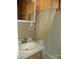 Bathroom with neutral color, vanity with sink, a mirror and a shower and bathtub combo at 124 Hummingbird Cir, New London, NC 28127