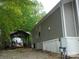 Exterior of home featuring a covered gazebo and durable vinyl siding at 124 Hummingbird Cir, New London, NC 28127