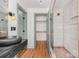 Updated bathroom with large black vessel sink, walk-in shower, and modern fixtures at 1314 Eddie St, Gastonia, NC 28054