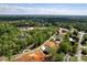 An aerial view of a new construction neighborhood shows tree-lined streets and new homes at 139 Poplar Grove Rd, Mooresville, NC 28117