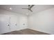 Bright bedroom featuring a ceiling fan, recessed lights, and two closet doors at 139 Poplar Grove Rd, Mooresville, NC 28117