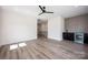 Bonus room features beverage fridge, accent wall and stairway at 139 Poplar Grove Rd, Mooresville, NC 28117