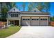 Charming home featuring a three-car garage and well-maintained lawn at 139 Poplar Grove Rd, Mooresville, NC 28117