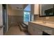 Large bathroom with a tub, shower, and vanity, features a large window for plenty of light at 1404 Oakdale Rd, Rock Hill, SC 29730