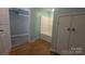 Hallway leading to the bathroom features a tub and white tiled surround at 1404 Oakdale Rd, Rock Hill, SC 29730