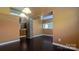 Dining room with hardwood floors, contemporary lighting, and a large window that offers plenty of natural light at 1404 Oakdale Rd, Rock Hill, SC 29730