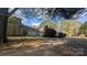 Two-story home featuring an attached garage and covered entry way at 1404 Oakdale Rd, Rock Hill, SC 29730