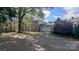 Two-story home featuring an attached garage and a spacious driveway at 1404 Oakdale Rd, Rock Hill, SC 29730