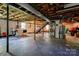 Spacious unfinished basement with utilities, washer/dryer, and a staircase at 1410 Beverly Ave, Shelby, NC 28152
